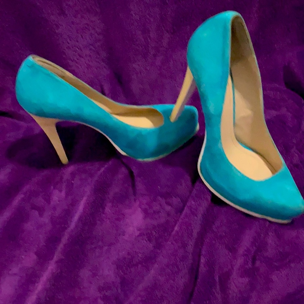 Teal with white soles closed toe pumps